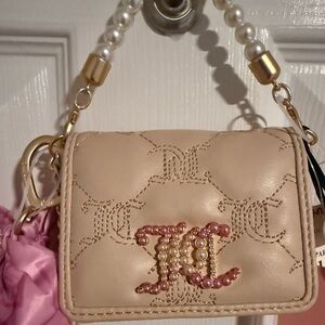 NWT Juicy Couture “Tie The Knot” Pearl Handle Mini Bag in Sandstone/Pink